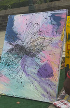 Load image into Gallery viewer, Abstract, paint pour art piece with colorful splashes on display. 48 x 48inch
