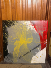 Load image into Gallery viewer, Close-up view of ‘Grace Over Chaos,’ by Andromeda Cook, featuring a bold gold burst over layered black, gray, red, and blue sections; on display at October Art Gallery in Philadelphia.
