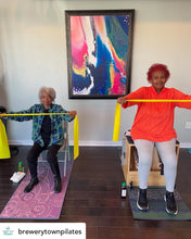 Load image into Gallery viewer, Pursuit of Happiness painting by Philadelphia artist Andromeda Cook displayed at Brewerytown Pilates studio
