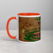 Load image into Gallery viewer, Collector coffee mug with orange interior featuring the phrase Keep Ya Head Up and original artwork by Lamonte from Andromeda Cook Studio

