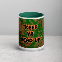 Load image into Gallery viewer, Dark green accent mug with the message Keep Ya Head Up featuring expressive artwork created by young artist Lamonte

